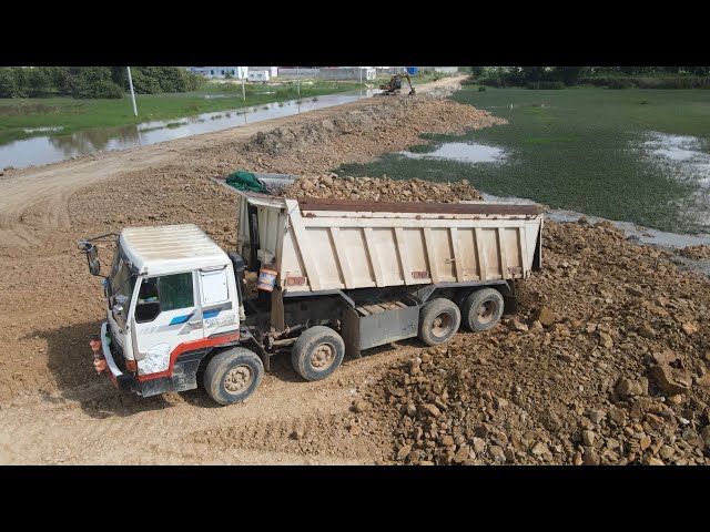 Super operation Dump trucks moving stone and Soil to Bulldozer pushing in the water | Machine Kh
