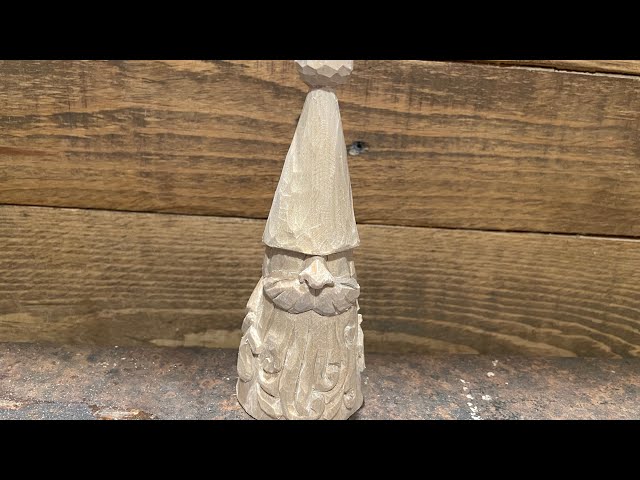 Woodcarving of Wintertime gnome￼