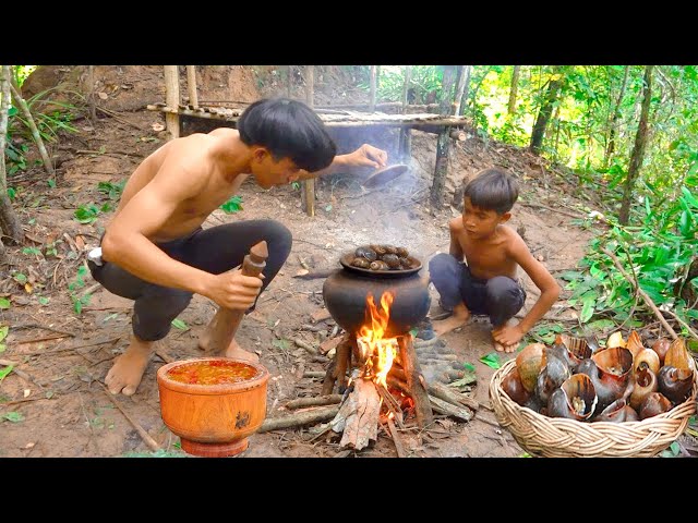 Building Hut For Rainy Season And Cooking Snail Recipe Eating Delicious