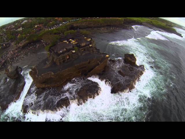 Epic Drone Footage Bali Indonesia - Sunset Over Tanah Lot Water Temple With Crashing Surf