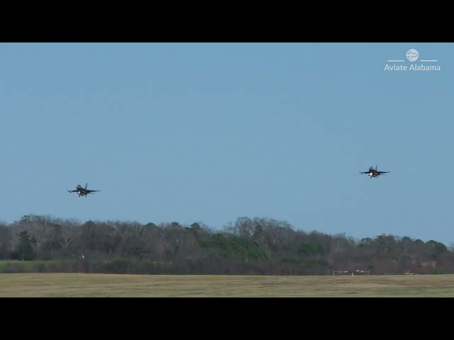 2 F-16 Fighter Jets Fly Over International Airport