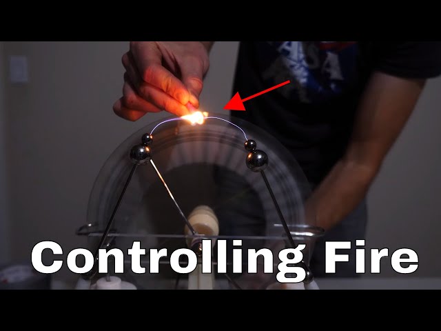Controlling Fire With My Hands Using a Wimshurst Machine