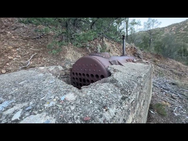 Hidden Mine shaft. Vintage mining boiler. (Magdalena Mountains)