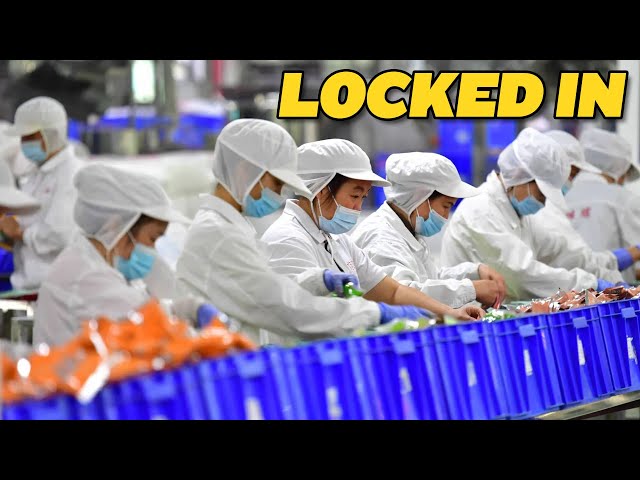 Shanghai Locks Workers in Factories Amid Covid Scare