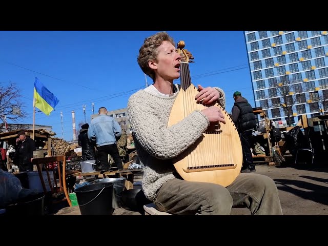 He sings in Ukraine’s bomb shelters and on the front (updated)