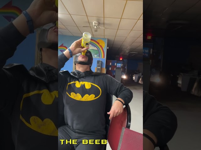 Batman has a drink