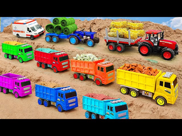 Dump Truck, Tractor, Ambulance transporting to build Road Construction