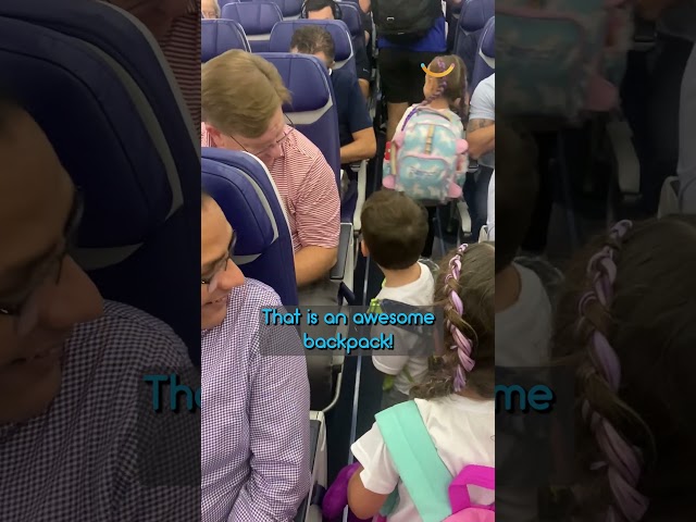 Funny kid brightens airplane passengers day 🤗 #shorts