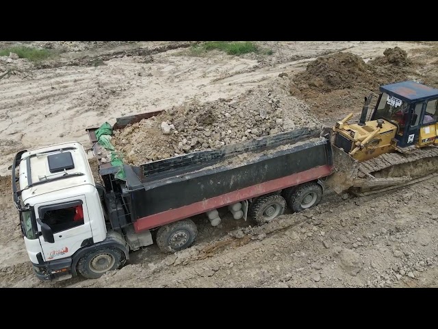 Super Komatsu Bulldozer Operator moving rock and Dumper truck dumping land filling up | Machine Kh