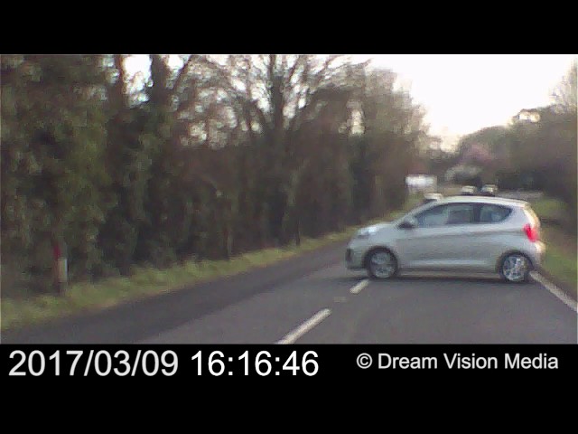 Driver caught on dashcam driving the wrong way down the A24 into oncoming traffic