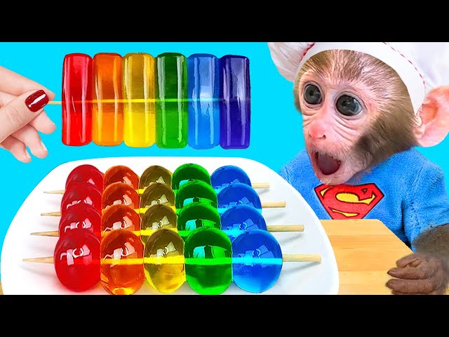 Monkey Baby Bon Bon eats rainbow jelly with ducklings and plays with balloons with puppies