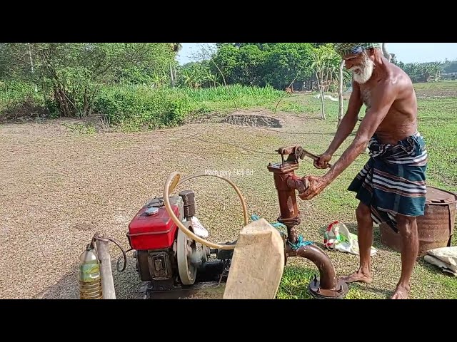 A skill farmer try to lifting water by 5hp diesel engine water pump.5hp water pump start process.