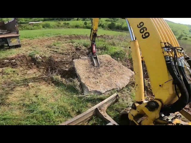 loading huge rocks with the komatsu excavator and the ford ltl 9000 part 1