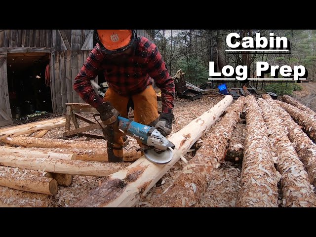 Peeling Logs for a Log Cabin
