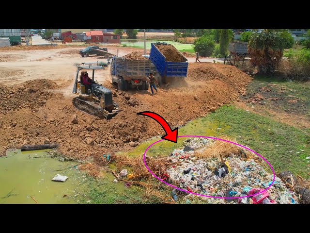 updated second day delete theTrash by Dozer Mitsubishi  with dump trucks unloading