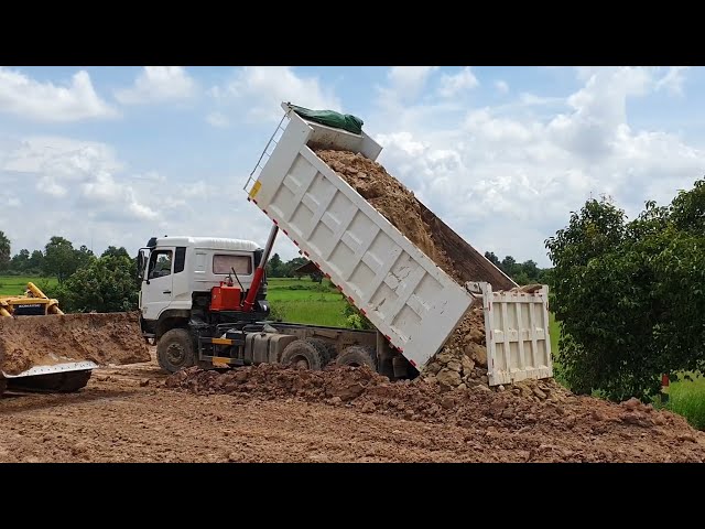 Strongly Operator Bulldozers and Dumper team operation pushing rock and stone | Machine Kh