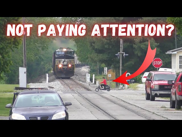 KID not paying attention while train is coming down the tracks!!! BEE-LINE takes the Street-Run