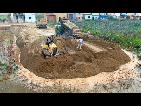 Komatsu Bulldozer Pushing Sand