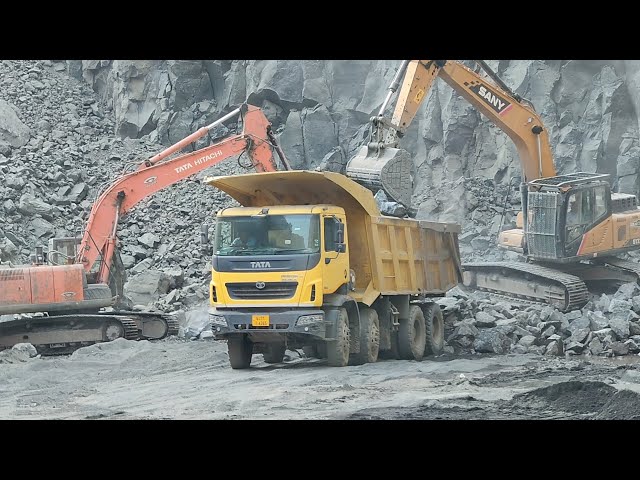 SANY excavator working and Tata prima loding treck video quarry works milan, Hitachi excavator