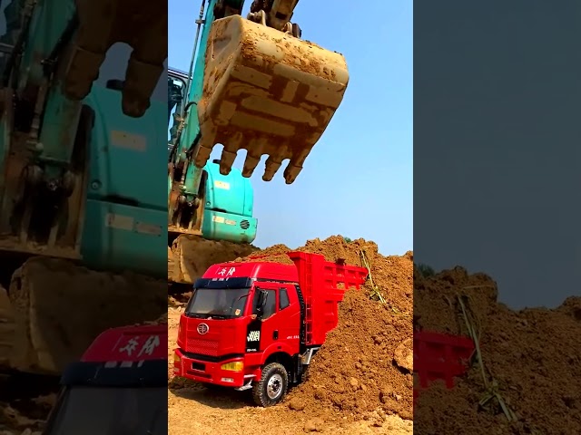 Big Excavator working with small dump Truck