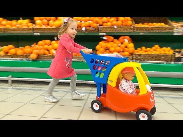 Funny Kid and Baby Doll Lola doing shopping