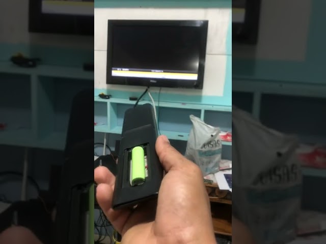 Controle remoto TV com carregador de bateria 2