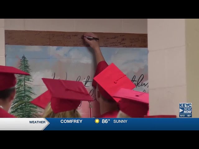 Dakota Meadows class of 2020 sign their mural four years later