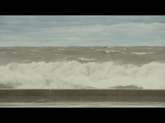 High waves up to 18 feet slam Lake Michigan shoreline