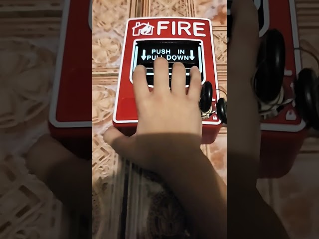 pulling a fire alarm