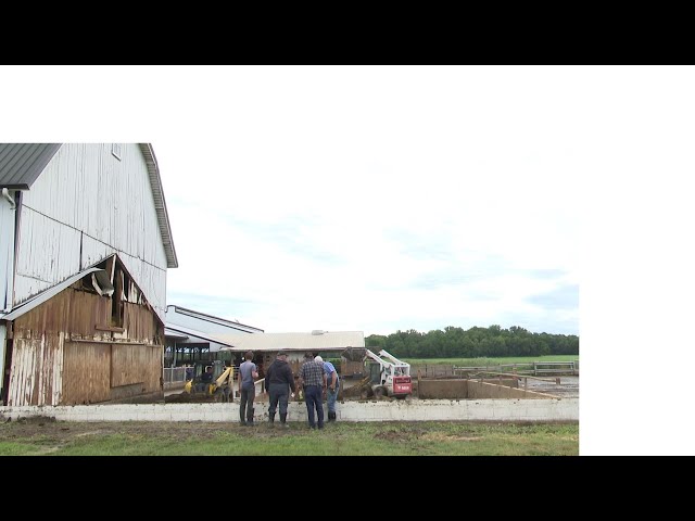 Community comes together to rebuild damaged barn