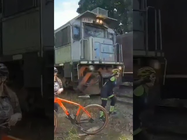 WATCH: Cyclist taking selfie hit by oncoming freight train #shorts