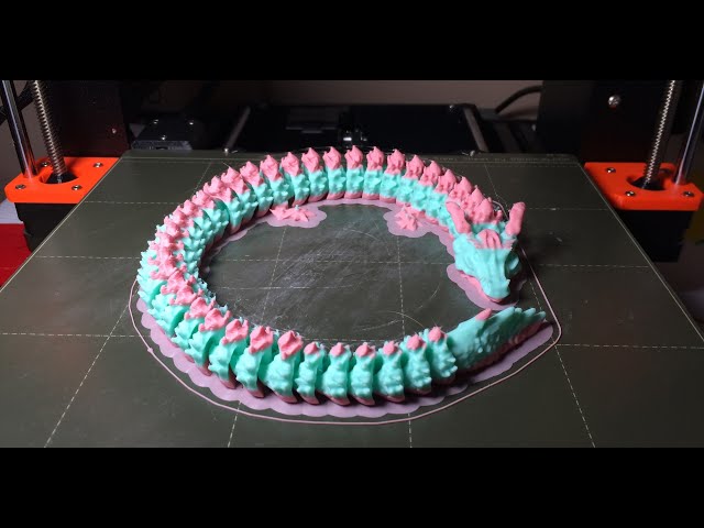 pink and teal articulating dragon
