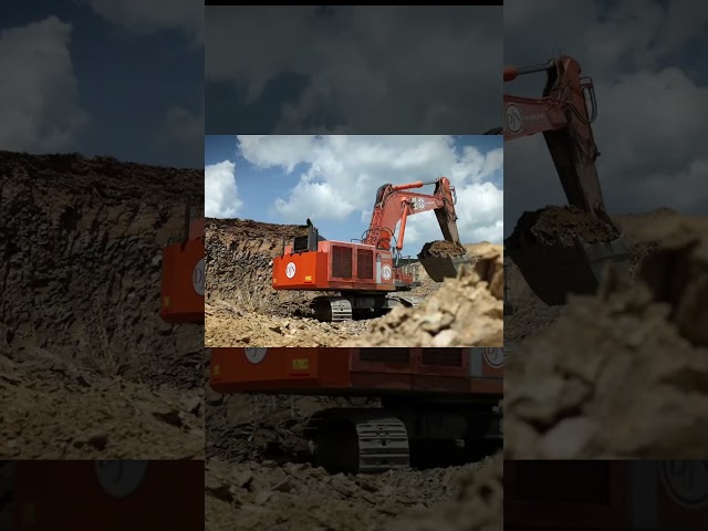 Large Hitachi excavator at Trois-Ponts reservoir, Belgium