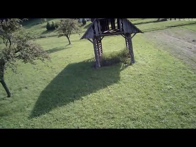 quadcopter FPV: crash, aerobatics and fly through a barn