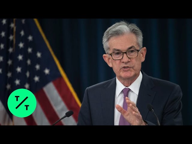 Fed Holds Interest Rates Steady, Hints at Future Cuts