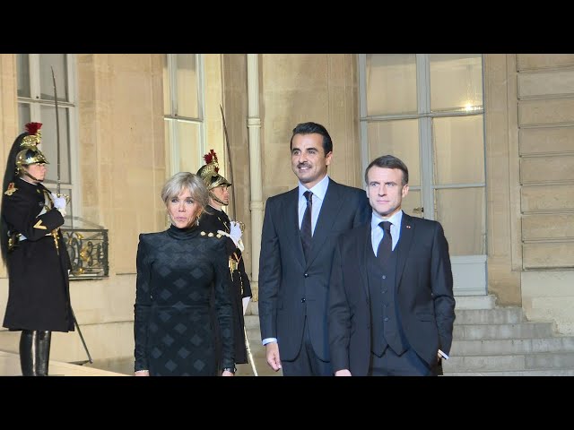 Emir of Qatar arrives in Paris for state dinner with French president, first lady | AFP
