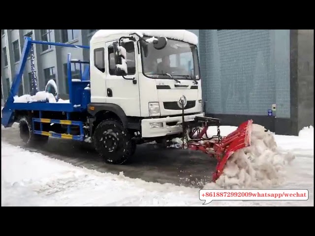 china garbage truck with snow shovel working video