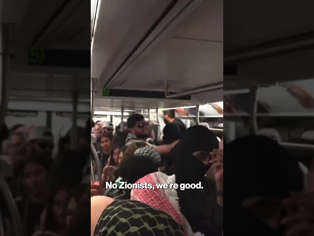 Masked anti-Israel protesters take over NYC subway car, tell ‘Zionists’ to raise their hands #shorts
