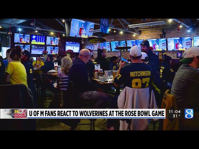 Excited Michigan fans watch Rose Bowl at local bars