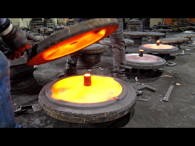 Cast iron pan manufacturing process. Metal foundry in South Korea.