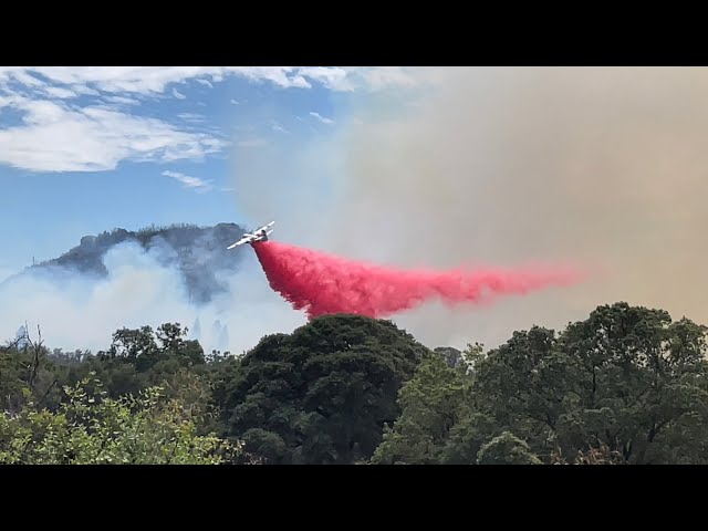 S-2T fire plane dropping fire retardant on the Brandie fire in loma rica California 6/11/2022