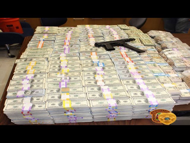 Buckets of money found in wall of home during drug bust in Miami Lakes