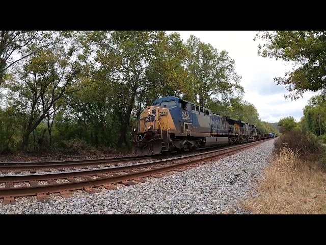 A very short CSX Manifest train Westbound passing through Sir John's Run West Virginia
