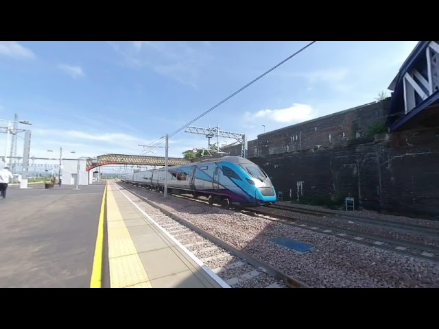 Transpenine express passing Carstairs on 2023-07-13 at 1915 in VR 180