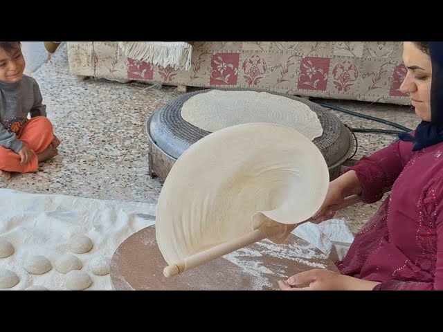 Neighbor's help to Razia: baking local bread