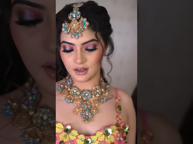 Shimmery Pink Eyes with Turquoise Liner for this Mehndi Look