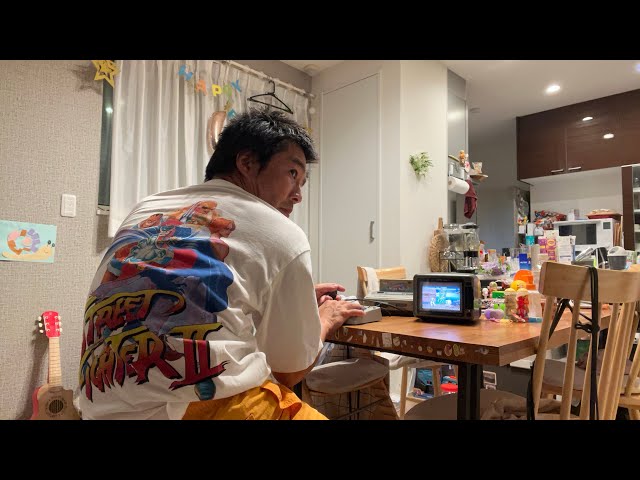 I’m 50-year-old Japanese man struggling with meaningless life. Happy when playing Street Fighter 2.
