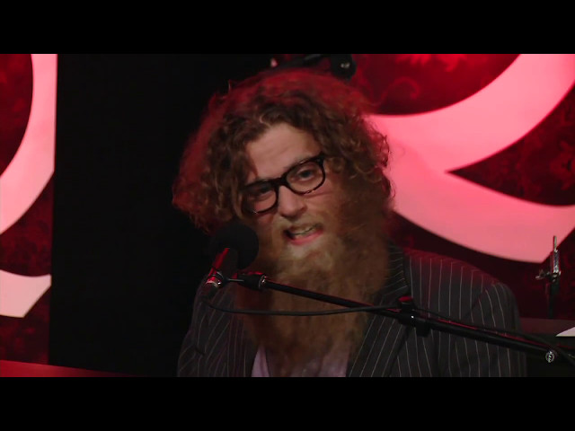 Ben Caplan warms up his pipes demonstrating vocal technique
