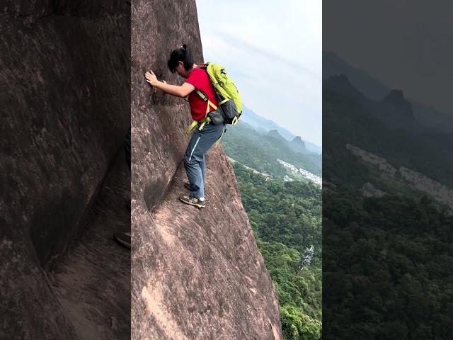 Dangerous climbers of Danxia Mountain in Shaoguan, Guangdong Province #travel #chinatourism