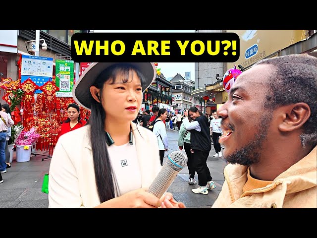 CHINESE GIRL SHOCKS AT A BLACKMAN SPEAKING CHINESE LANGUAGE IN THE STREET...BLACK IN CHINA